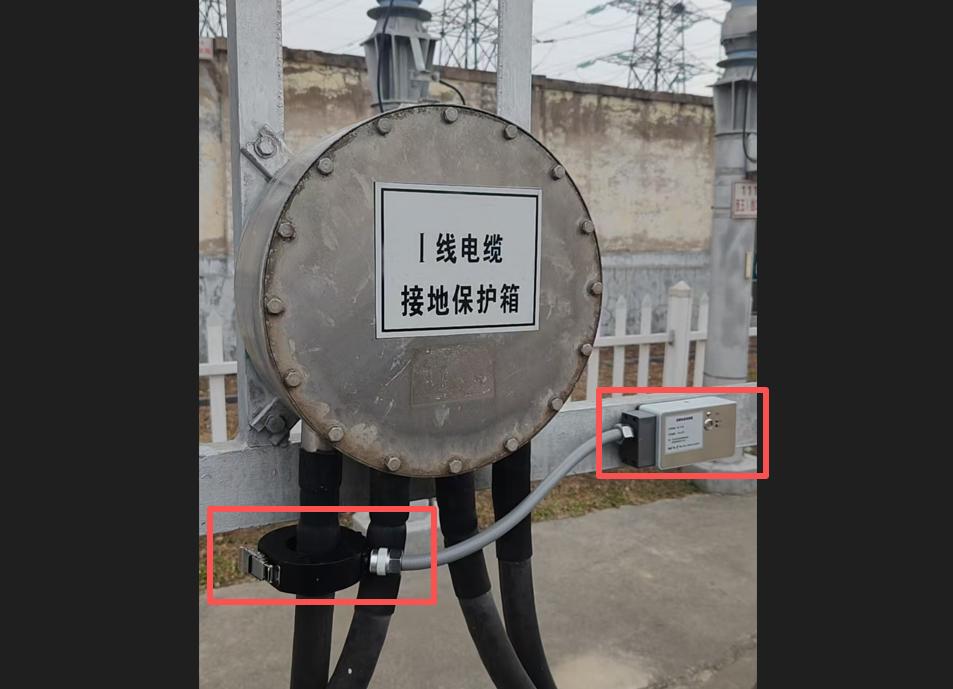 HFCT sensor installed on cable grounding link box for partial discharge monitoring.